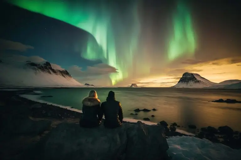 Tourists enjoying a breathtaking view of the Northern Lights over a snowy Finnish landscape during a custom night tour in Finland