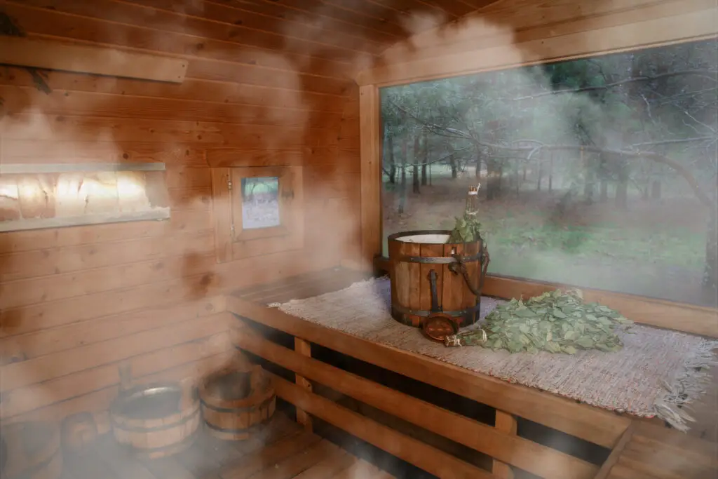 Traditional Finnish sauna interior with wooden benches and accessories for a relaxing experience in Finland.